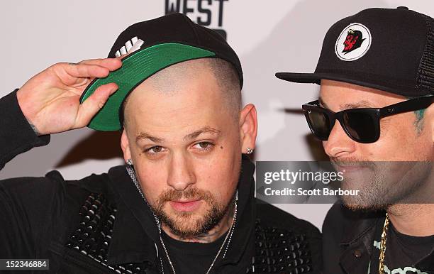 Joel Madden and Benji Madden of Good Charlotte attend Footy at The West End on September 19, 2012 in Melbourne, Australia.