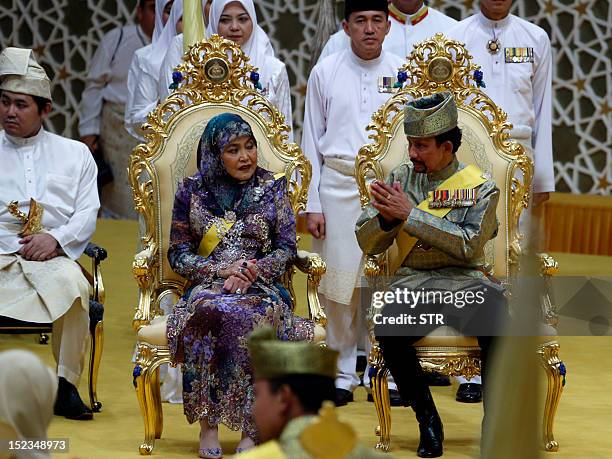 Brunei's Sultan Haji Hassanal Bolkiah and Queen Raja Isteri Pengiran Anak Hajah Saleha attend a ceremony ahead of the Royal Wedding of Princess...