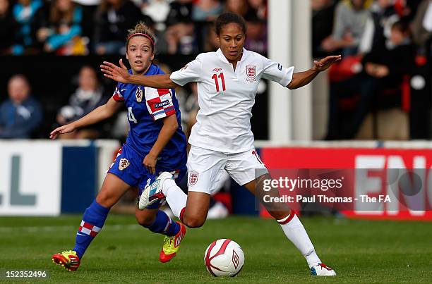 Rachel Yankey of England in action with Andrea Martic of Croatia during the UEFA European Women's 2013 Championship Qualifier between England and...