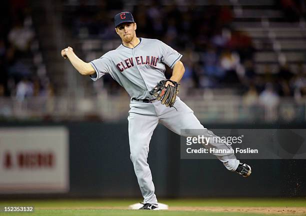 Cord Phelps of the Cleveland Indians makes a play at second base against the Minnesota Twins on September 10, 2012 at Target Field in Minneapolis,...
