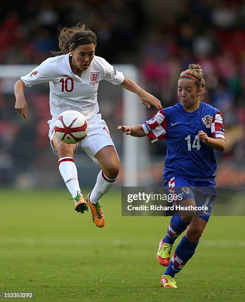 Fara Williams of England controls the ball infront of Andrea Martic of Croatia during the UEFA Women's EURO 2013 Group 6 Qualifier between England...