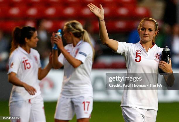 Sophie Bradley of England waves to the home fans after the UEFA European Women's 2013 Championship Qualifier between England and Croatia at Banks's...