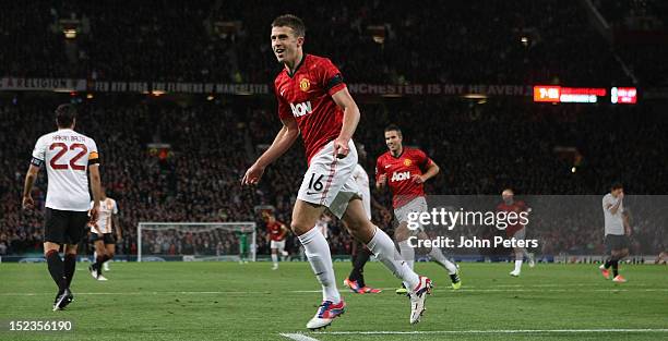 Michael Carrick of Manchester United celebrates scoring their first goal during the UEFA Champions League Group H match between Manchester United and...