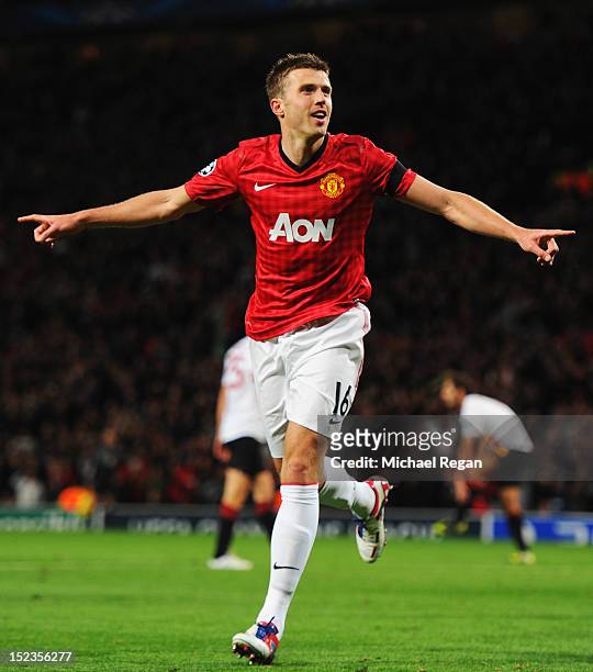 Michael Carrick of Manchester United celebrates as he scores their first goal during the UEFA Champions League Group H match between Manchester...