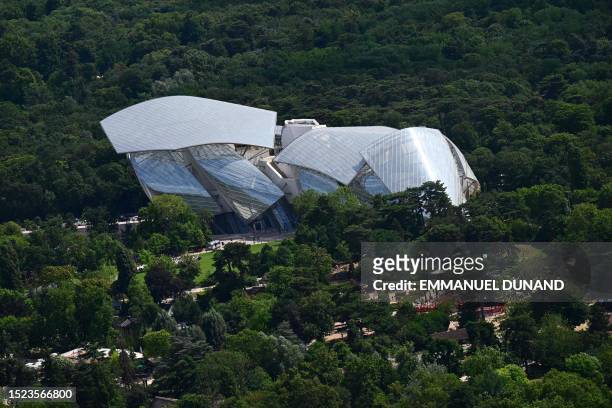 This aerial photograph taken on July 11 onboard a helicopter of the French army shows a view of the Louis Vuitton Foundation in the Bois de Boulogne,...