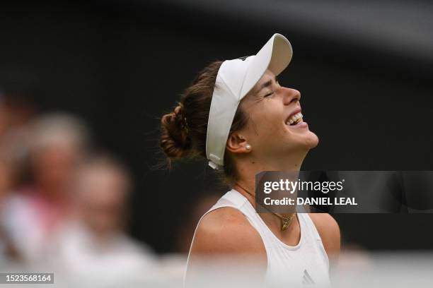 Ukraine's Elina Svitolina celebrates winning against Poland's Iga Swiatek during their women's singles quarter-finals tennis match on the ninth day...