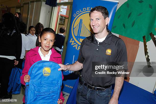 Golden State Warriors Assistant Coach Darren Erman visits with students at Garfield Elementary on September 17, 2012 in Oakland, California. NOTE TO...