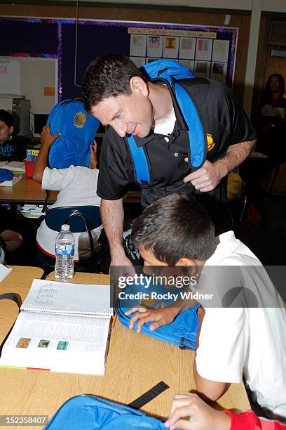Golden State Warriors Assistant Coach Darren Erman visits with students at Garfield Elementary on September 17, 2012 in Oakland, California. NOTE TO...