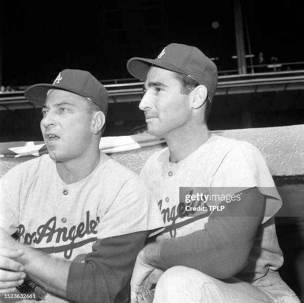 Pitchers Johnny Podres and Sandy Koufax of the Los Angeles Dodgers stand on the dugout steps prior to Game 1 of the 1963 World Series against the New...