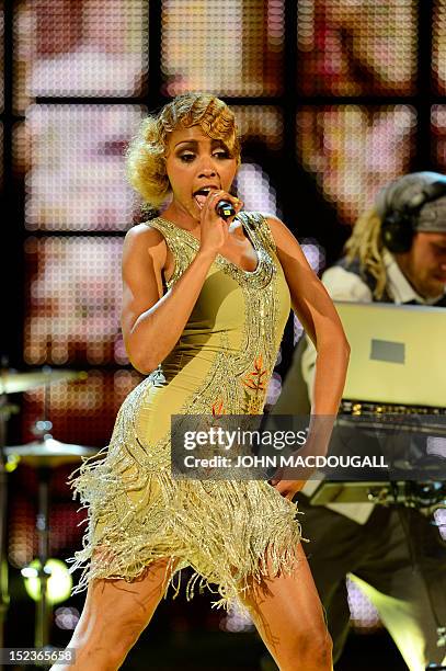 German singer Alice Francis performs during the Golden Hen media prize awards ceremony on September 19, 2012 in Berlin. AFP PHOTO POOL / JOHN...