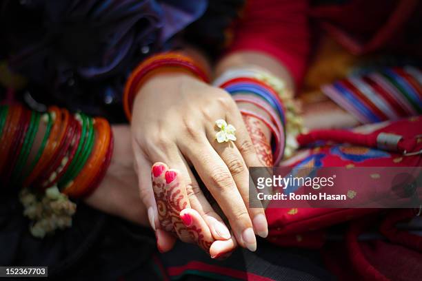 girls holding hands together - poila baishakh stock pictures, royalty-free photos & images