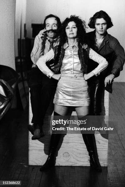 Andy Warhol 'Superstars' actor Taylor Mead, actress Ultra Violet, and poet and photographer Gerard Malanga pose for a portrait at Andy Warhol's...