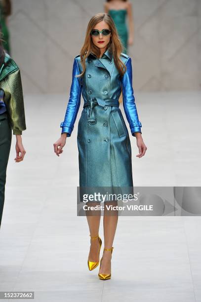 Model showcases designs on the catwalk by Burberry Prorsum on day 4 of London Fashion Week Spring/Summer 2013, at Kensington Gardens on September 17,...