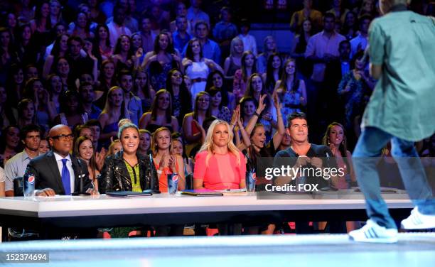 Judges L.A. Reid, Demi Lovato, Britney Spears and Simon Cowell at THE X FACTOR airing Wednesday, Sep. 19, 2012 on FOX.