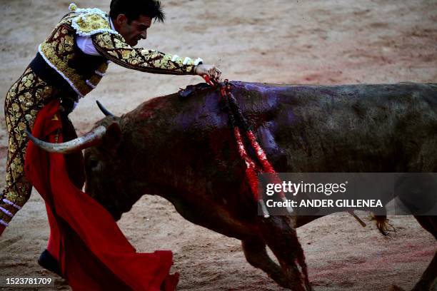 Spanish bullfighter Alejandro Talavante kills a bull during a bullfight of the San Fermin festival in Pamplona, northern Spain on July 11, 2023.