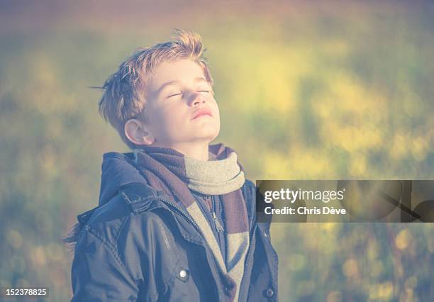 boy breathing fresh air - fresh air breathing stockfoto's en -beelden