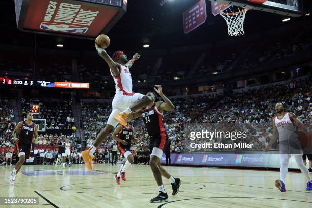 Tari Eason of the Houston Rockets looks to shoot the ball over Jabari Walker of the Portland Trail Blazers during the second quarter at the Thomas &...