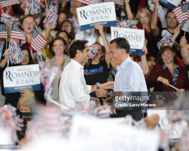 Republican presidential candidate Mitt Romney and his son Craig Romney attend Juntos Con Romney Rally at Miami-Dade County Fair and Exhibition on...