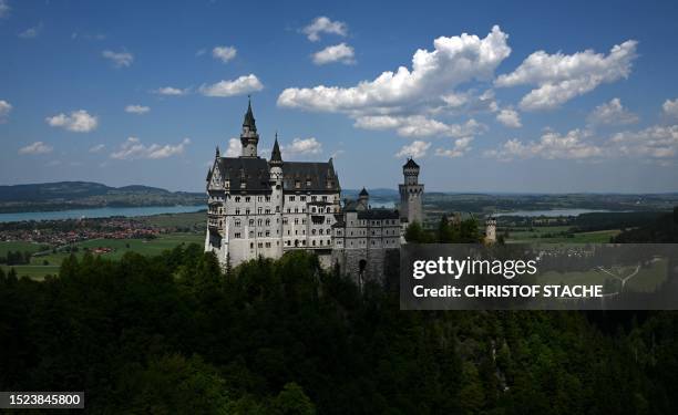 The Neuschwanstein castle near Fuessen, in the Allgaeu Alps mountains, southern Germany, is pictured on July 11, 2023. Neuschwanstein Castle is a...