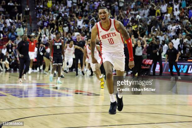 Jabari Smith Jr. #10 of the Houston Rockets reacts after hitting a game-winning 3-pointer against the Portland Trail Blazers during the fourth...