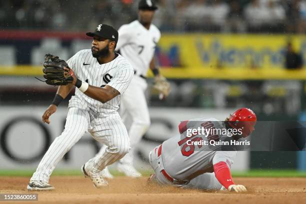 Nolan Gorman of the St. Louis Cardinals steals second base in the third inning against Elvis Andrus of the Chicago White Sox at Guaranteed Rate Field...