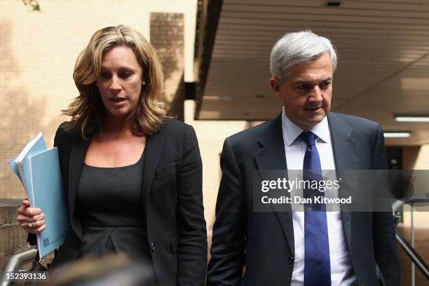 Former Cabinet Minister Chris Huhne leaves Southwark Crown Court after a pre-trial hearing on September 20, 2012 in London, England. Mr Huhne and his...