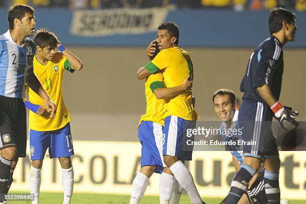 Paulinho and Wellington of Brazil in action during the first leg of the Superclasico de las Américas between Brazil and Argentina at Estádio Serra...