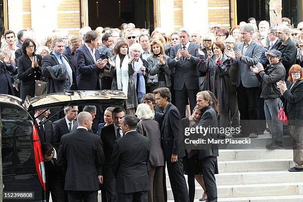 Artists attend actor Pierre Mondy's funeral at Eglise Saint-Honore-d'Eylau on September 20, 2012 in Paris, France.