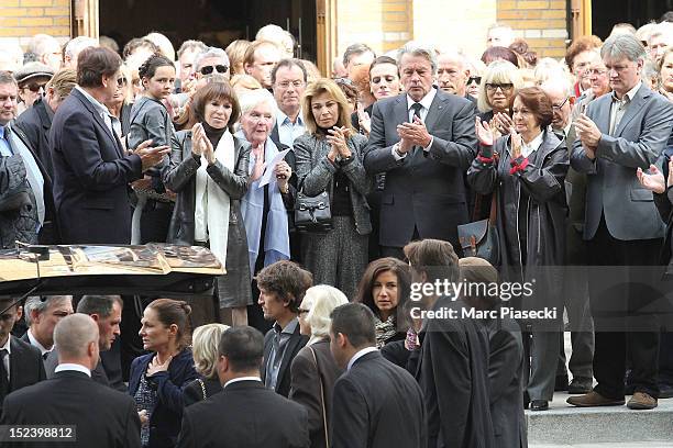 Artists attend actor Pierre Mondy's funeral at Eglise Saint-Honore-d'Eylau on September 20, 2012 in Paris, France.