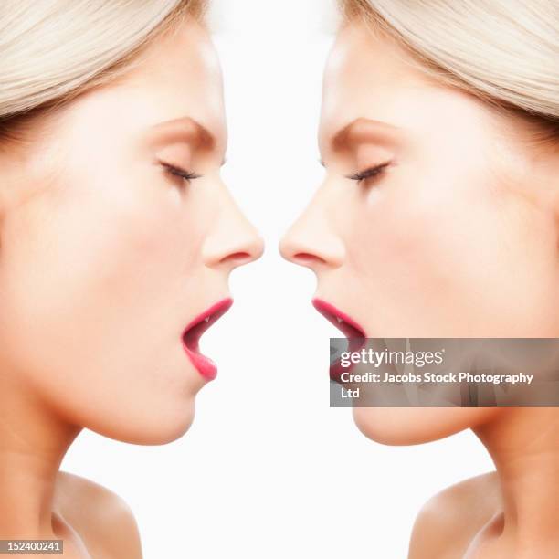 caucasian woman's reflection with mouth open - mouth open profile stock pictures, royalty-free photos & images