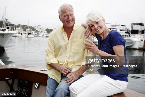 couple drinking wine on boat - dana point harbor marina stock pictures, royalty-free photos & images