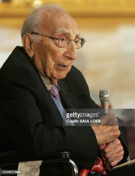 Dr Michael DeBakey, a pioneering heart surgeon, speaks after being presented with the Congressional Gold Medal during a ceremony in the Rotunda of...