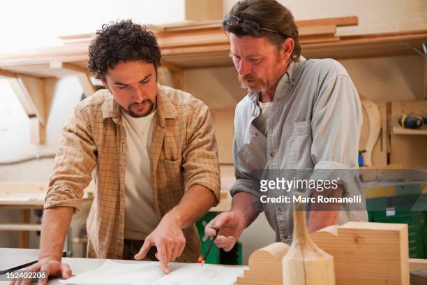 co-workers woodworking in workshop - goatee stock pictures, royalty-free photos & images