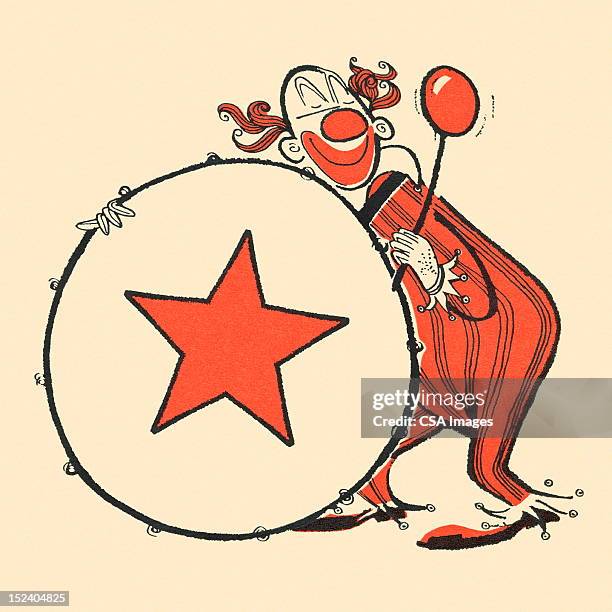 clown playing a bass drum - circus stock illustrations