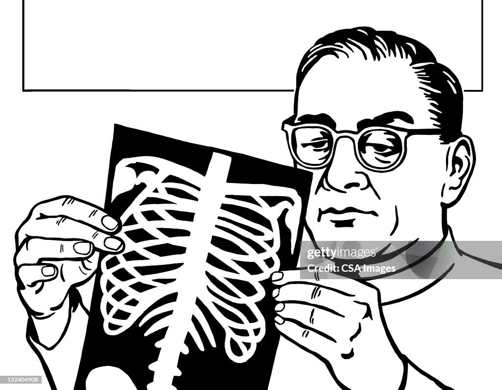 Man Looking at X-Ray