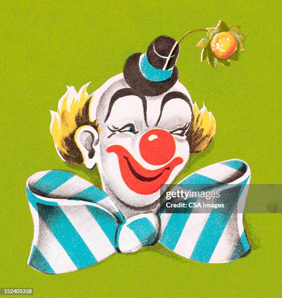 smiling clown wearing big bow - joker stock illustrations