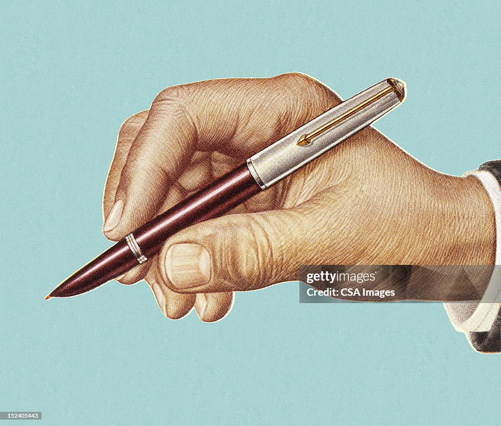 Man's Hand Holding Pen