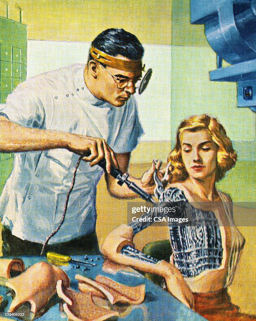Doctor Working on Robot Woman