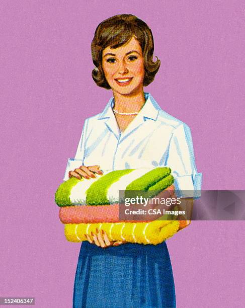 woman holding folded towels - house wife stock illustrations
