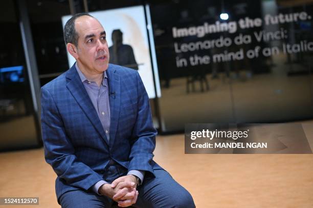 Public Library Executive Director Richard Reyes-Gavilan speaks during an interview about the "Imagining the Future" exhibition at the Martin Luther...