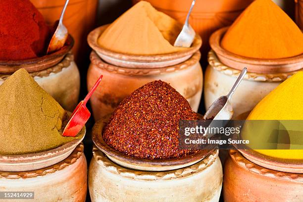 spice market, houmt souk, djerba, tunisia - smelling spices at food market stockfoto's en -beelden