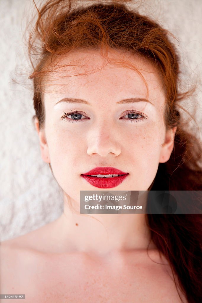 Young woman with red lipstick