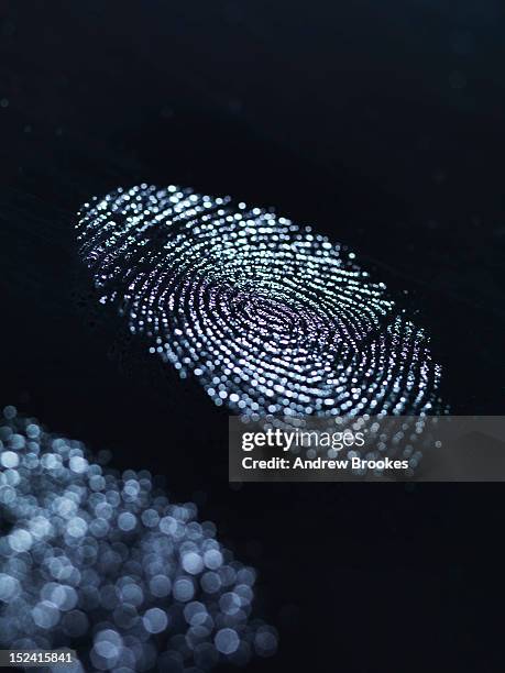 close up of fingerprints on surface - fingerprint stock-fotos und bilder