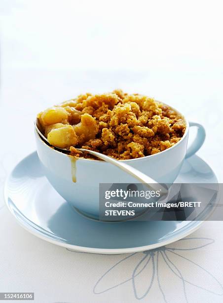 bowl of fruit crisp - cobbler stock pictures, royalty-free photos & images