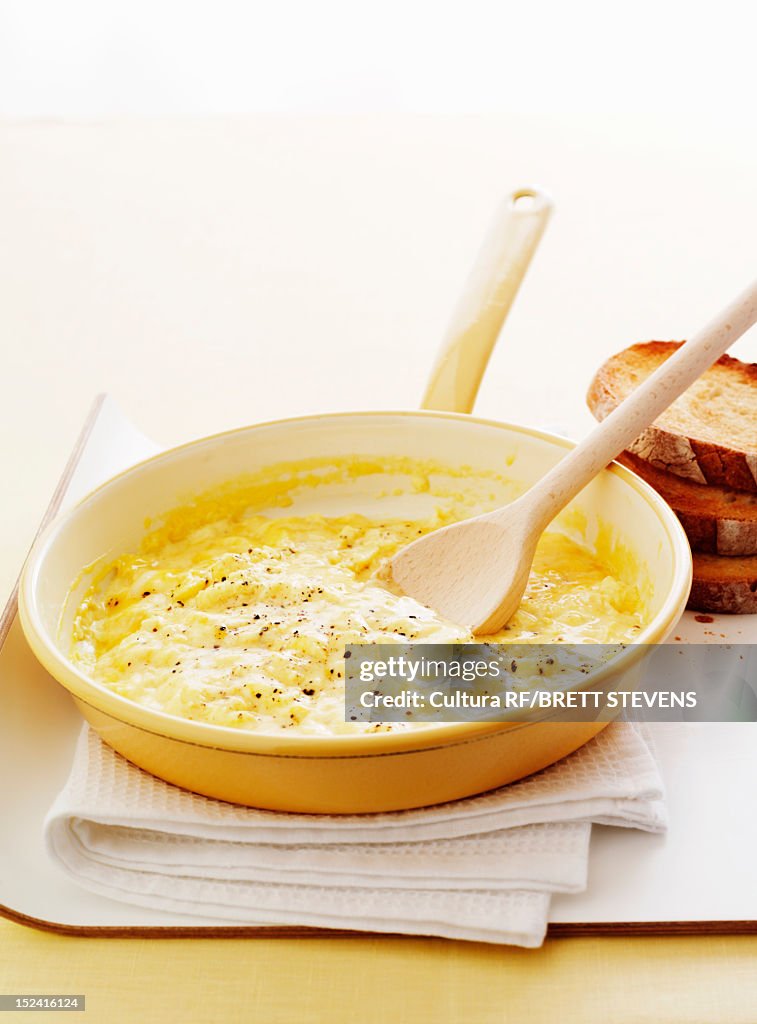 Dish of eggs with bread