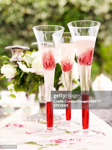 Glasses Of Champagne With Fruit, Foto de stock