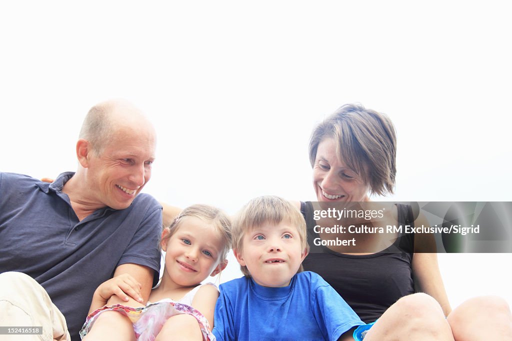 Family sitting together outdoors