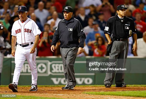 Manager Bobby Valentine of the Boston Red Sox walks back to the dugout after arguing a called three strike with home plate umpire Alfonso Marquez...