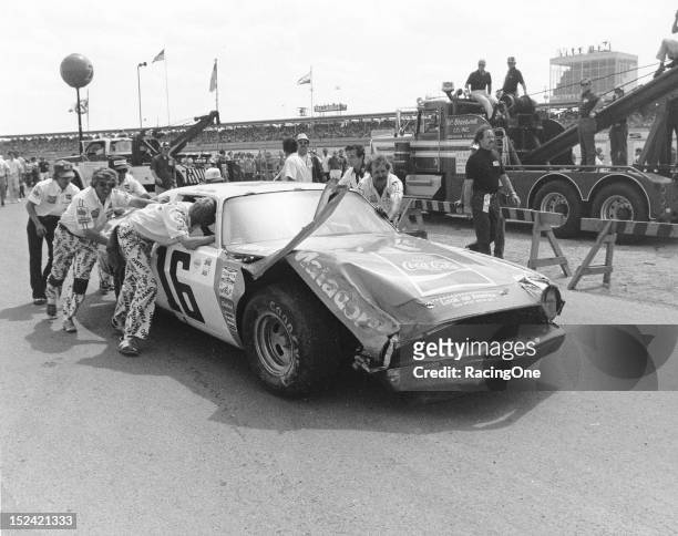 May 4, 1975: Bobby Allison’s Roger Penske-owned AMC Matador is pushed back to the pit area at Talladega Superspeedway during the Winston 500 NASCAR...