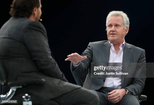 Salesforce CEO Marc Benioff looks on as General Electric CEO Jeff Immelt speaks during the Dreamforce 2012 conference at the Moscone Center on...